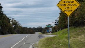 Road signs reading When Flooded Turn around Don't Drown