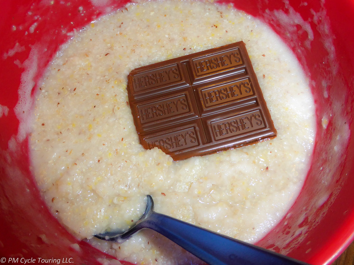 Hot cereal and a chocolate bar in a bowl